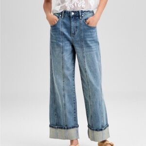 And Now This Light Blue Wide-Leg Jeans with giant cuffs